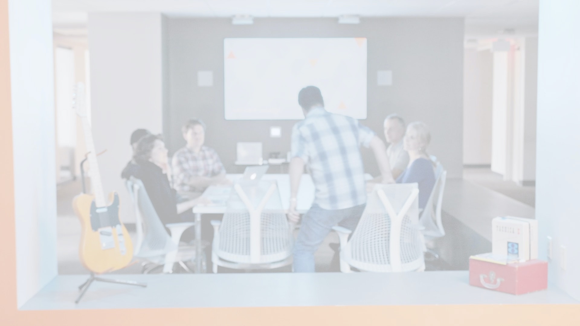 DIGITAL L MEDIA LTD staff in a conference room