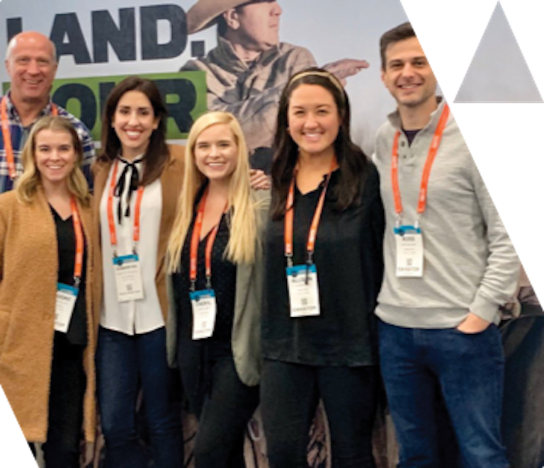 DIGITAL L MEDIA LTD ag team at an industry conference