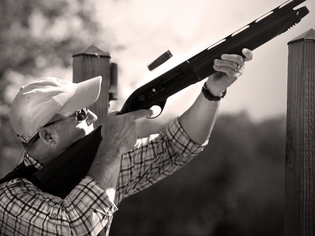 portrait of man shooting skeet